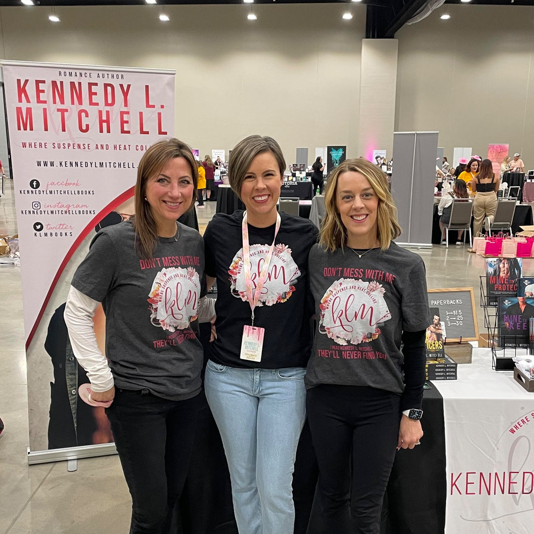 Kennedy L. Mitchell Event Shirt Unisex t-shirt - Novel Grounds