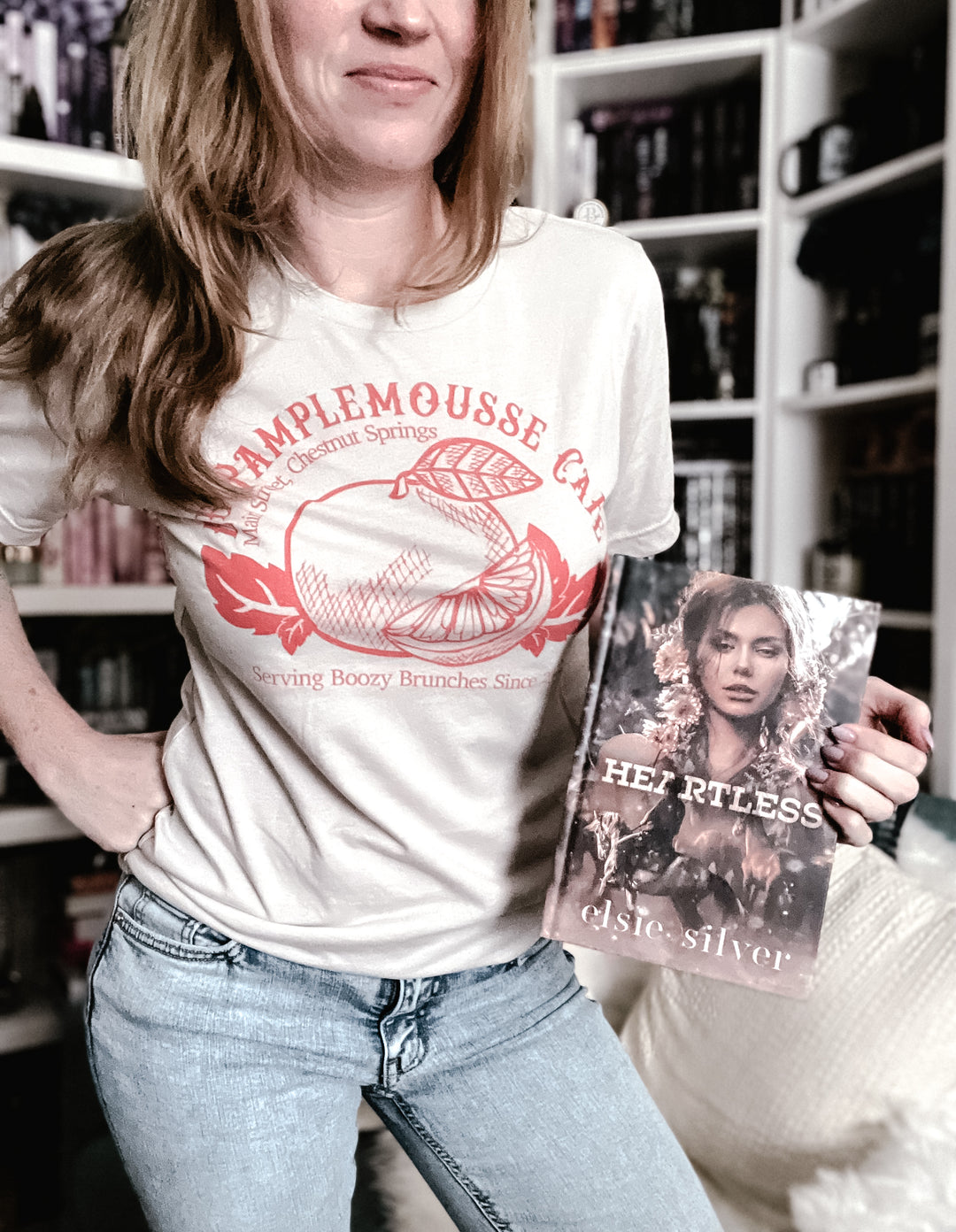 a woman holding a book in her hands