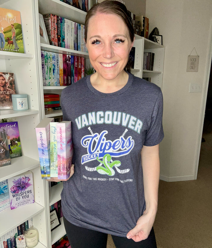 a woman standing in front of a book shelf