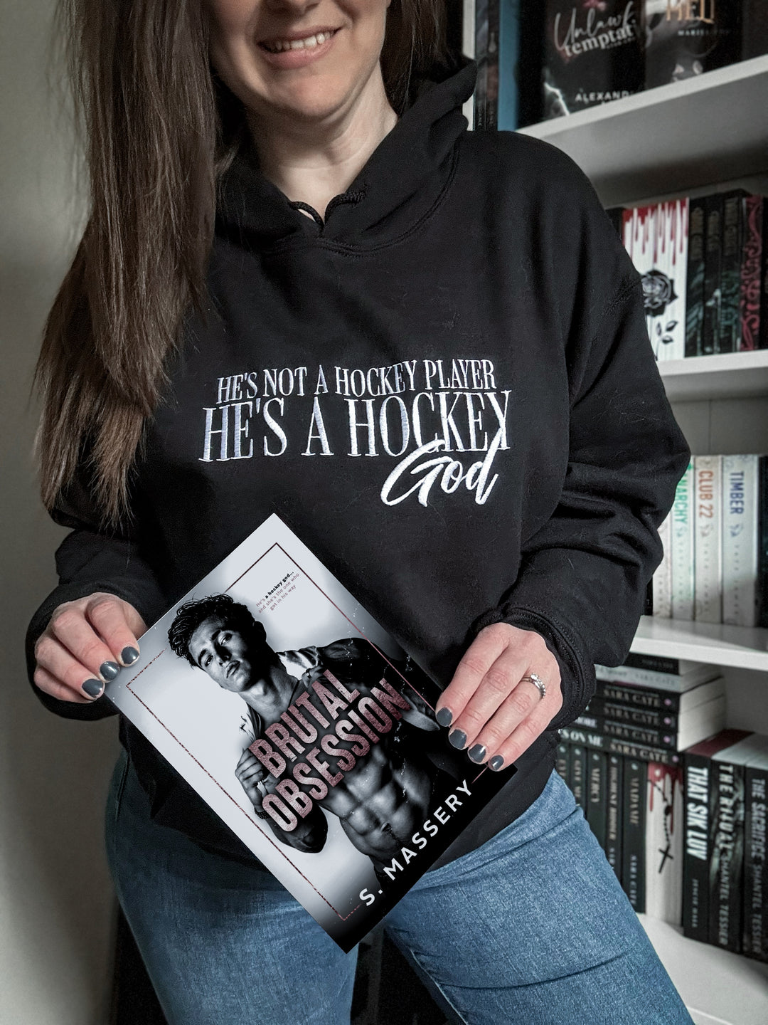 a woman holding a book in her hands