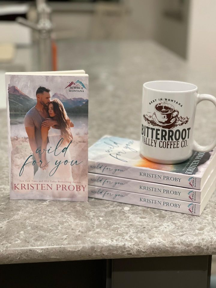 a couple of books sitting on top of a counter