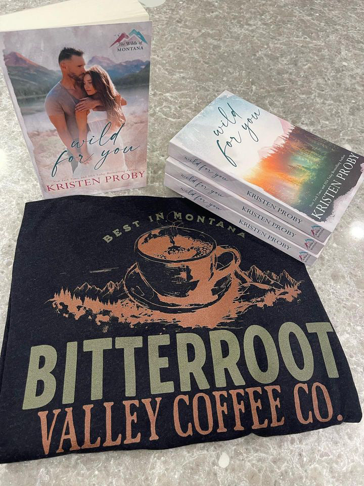 a couple of books sitting on top of a table