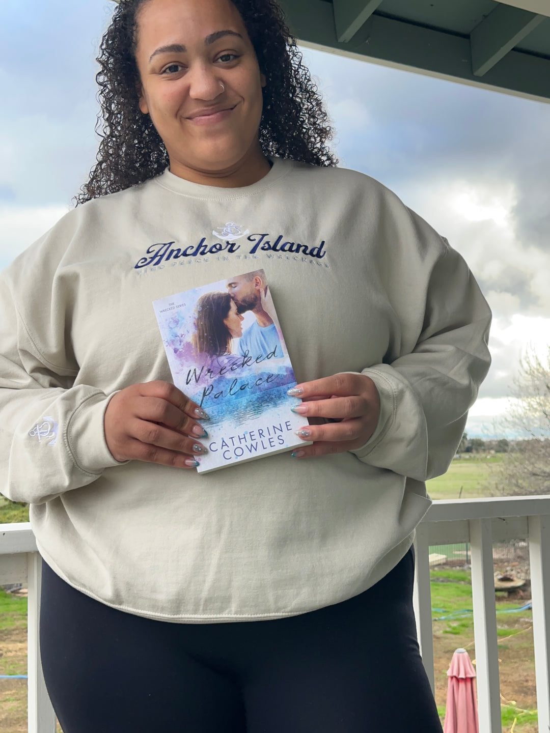 a woman holding a book in her hands