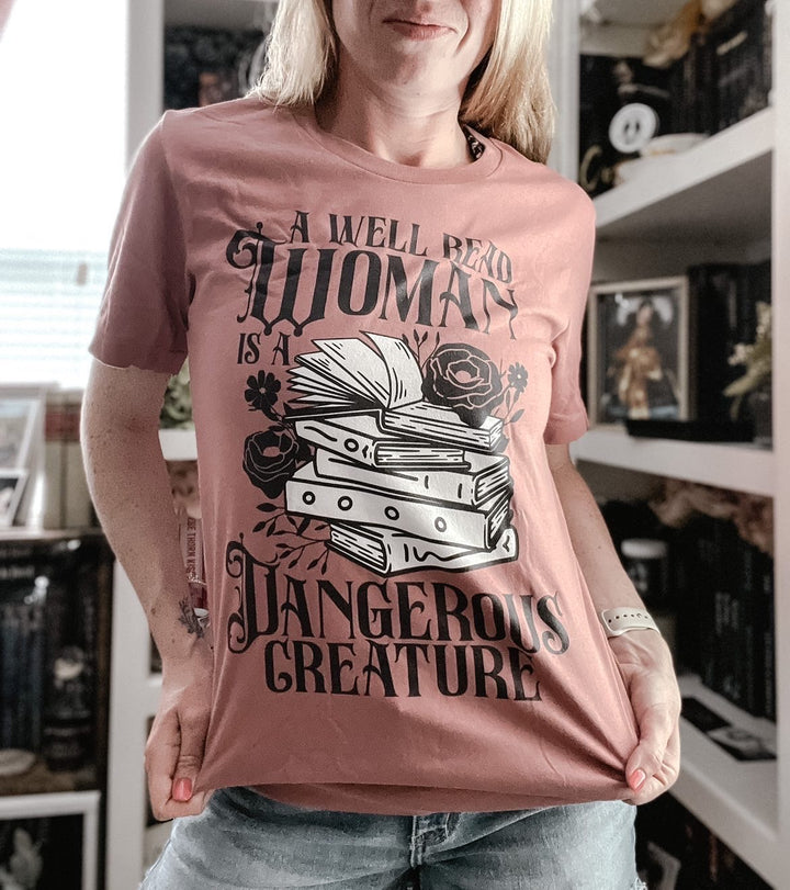 A Well Read Woman Short-sleeve unisex t-shirt - Novel Grounds