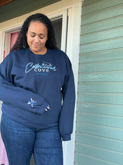 Laura Pavlov- Cottonwood Cove Embroidered Unisex Sweatshirt