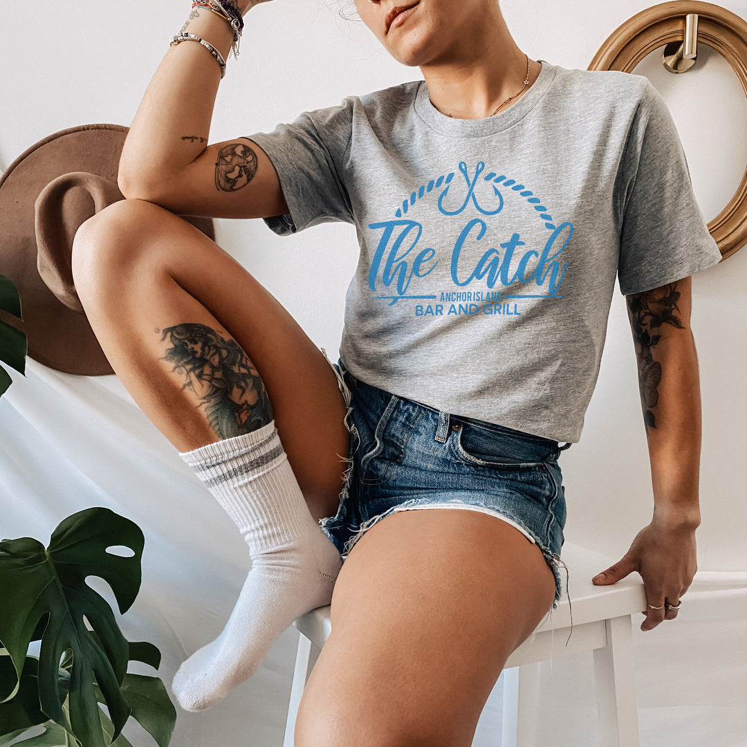 Catherine Cowles - The Catch T-Shirt - Novel Grounds